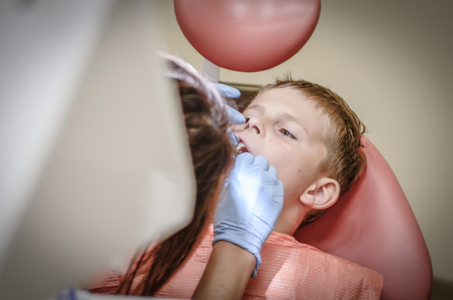 Warm, calm reception or dentist with patient